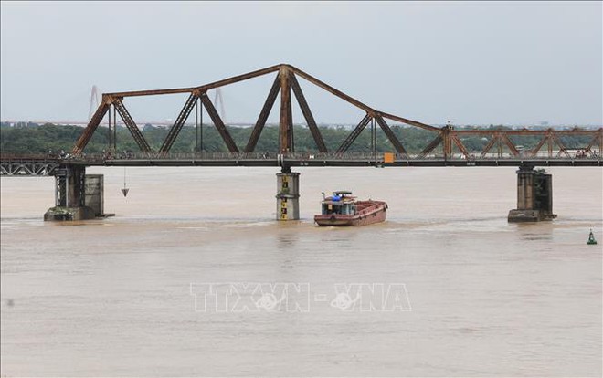 Mực nước sông Hồng ở Hà Nội lên nhanh, nguy cơ ngập lụt vùng trũng và bãi bồi - Ảnh 4.