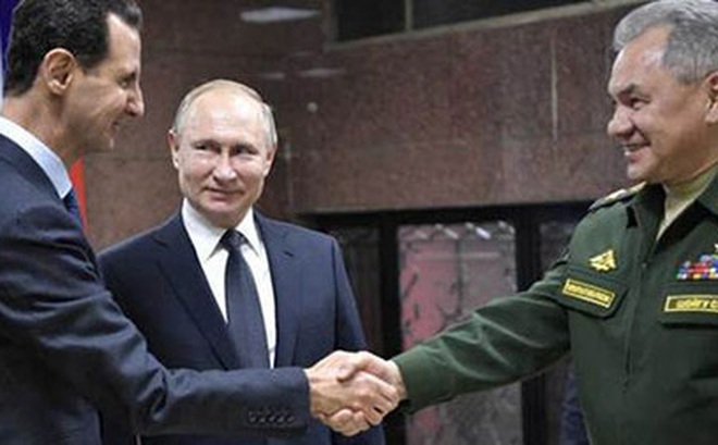 Tổng thống Nga Vladimir Putin, Bộ trưởng Quốc phòng Sergei Shoigu và Tổng thống Syria Bashar al-Assad tham dự cuộc họp ở Damascus, Syria, ngày 7-1-2020.
