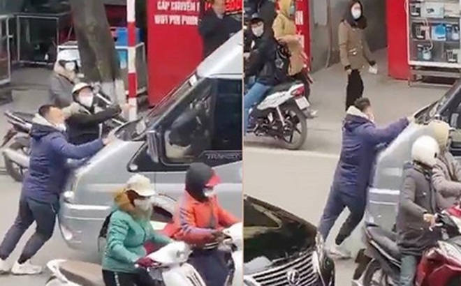 Tài xế xe ô tô 16 chỗ điều khiển phương tiện đẩy một người đàn ông trên phố Trần Đại Nghĩa.