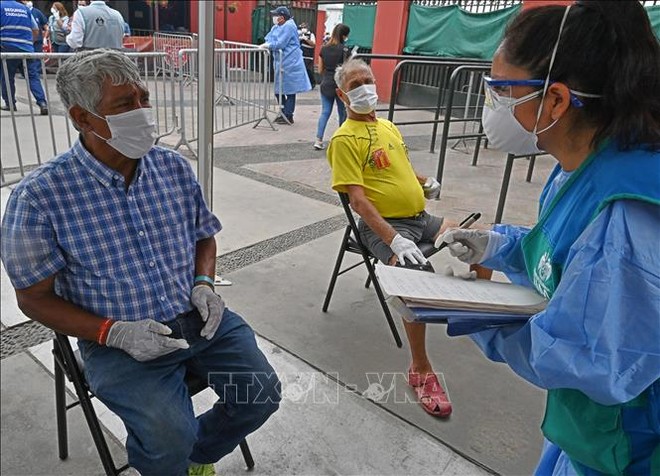 Số lượng vaccine khủng sắp đổ bộ Việt Nam trong tháng 10 - Láng giềng sát vách Việt Nam công bố mục tiêu đầy tham vọng - Ảnh 1.