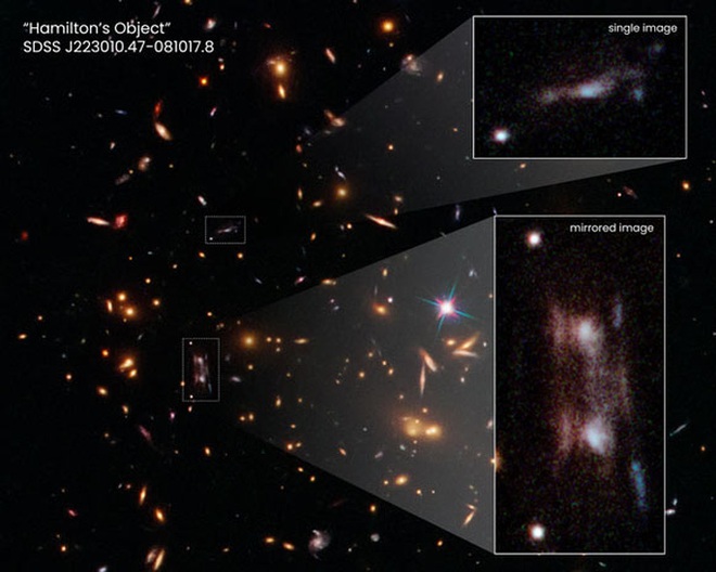 NASA/ESA chụp được quái vật bẻ cong không-thời gian, xé thiên hà làm 3 - Ảnh 1.