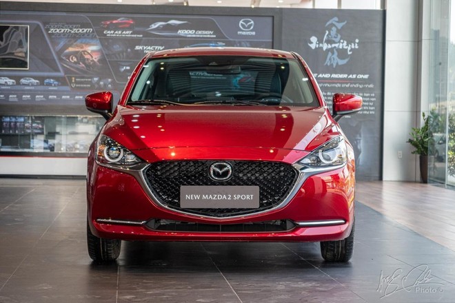 Mazda2 giảm giá 30 triệu đồng, cuộc chiến sedan hạng B tiếp tục nóng - Ảnh 1.