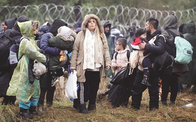 Người di cư tại biên giới Belarus - Ba Lan. Ảnh Getty Images.
