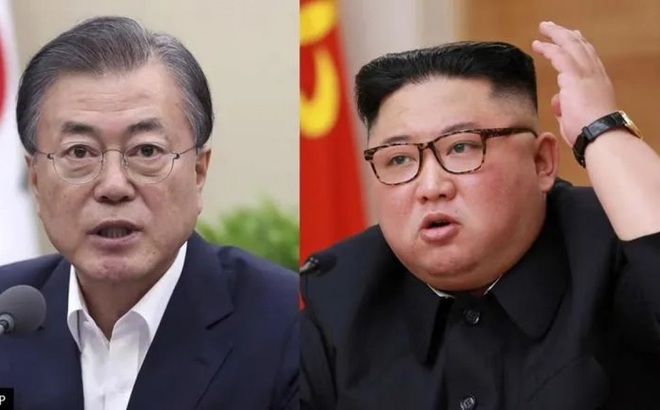 Tổng thống Hàn Quốc Moon Jae-in (trái) và Lãnh đạo Triều Tiên Kim Jong Un. Ảnh: AP.