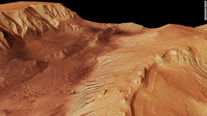 Phát hiện bất ngờ về “lượng nước đáng kể” tại hẻm núi sâu nhất Hệ Mặt trời trên sao Hỏa - Ảnh 2.