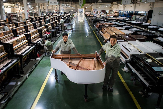 Bên trong nhà máy sản xuất đàn piano khổng lồ của Trung Quốc - Ảnh 5.