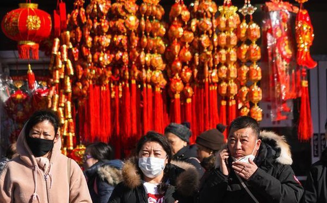 Chính quyền địa phương Trung Quốc có nhiều sáng kiến hỗ trợ nhằm khuyến khích người dân không về quê ăn Tết để ngăn chặn nguy cơ lây lan dịch Covid-19. (Ảnh: New York Times)