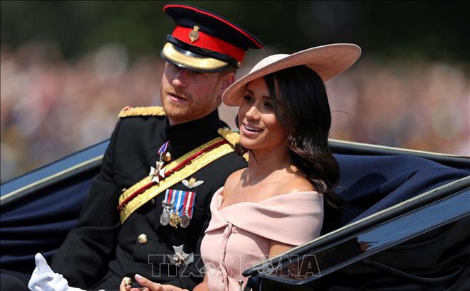 Hoàng tử Harry và vợ Meghan Markle tới một sự kiện ở London, Anh. Ảnh tư liệu: AFP/TTXVN