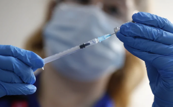Austrlaia vừa xác nhận 1 người bị Covid-19 sau khi tiêm vaccine Pfizer. Nguồn AP.