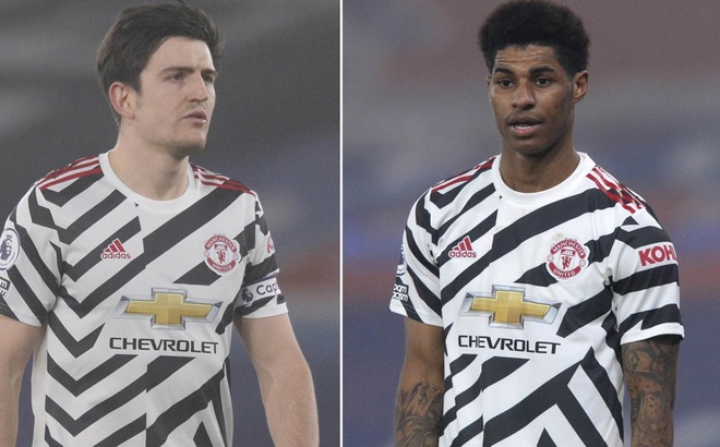 Harry Maguire và Marcus Rashford cãi vã ngay trên sân. (Ảnh: Daily Mail)