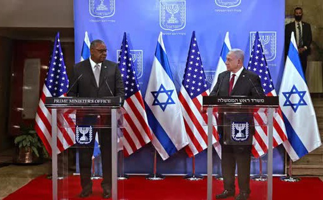 Bộ trưởng Quốc phòng Mỹ Lloyd Austin (bên trái) và Thủ tướng Israel Benjamin Netanyahu tại cuộc họp báo ở Jerusalem ngày 12-4 Ảnh: AP