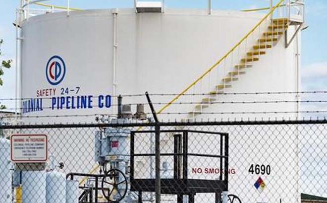 Nhóm tin tặc đứng sau vụ tấn công hệ thống ống dẫn dầu Colonial Pipeline bất ngờ lên tiếng xin lỗi. Ảnh: AFP