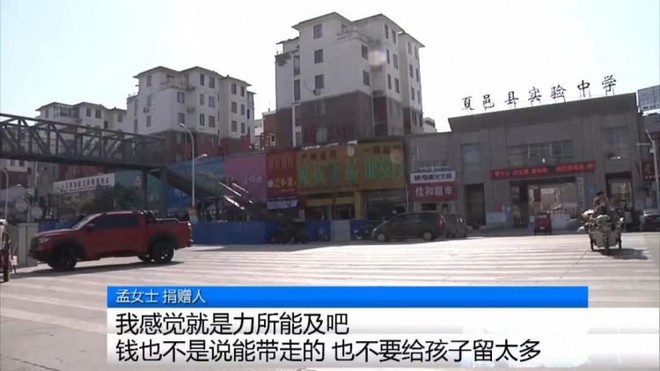 Người phụ nữ Trung Quốc chi 154.000 USD để xây cầu cho con qua đường an toàn - Ảnh 1.