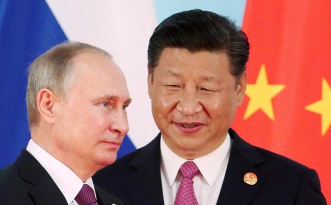 Tổng thống Nga Vladimir Putin và Chủ tịch Trung Quốc Tập Cận Bình. Ảnh: al Jazeera.