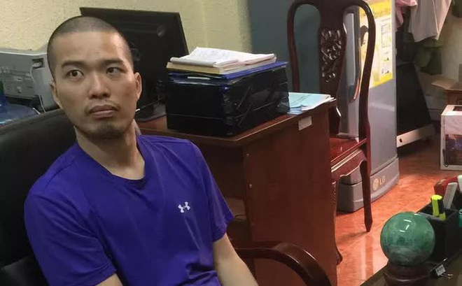 Nguyễn Minh Đạt ở cơ quan điều tra (Ảnh: Bộ Công an)