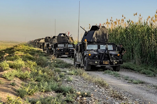 Phiến quân IS mon men tái lập nhóm tại Iraq - Ảnh 1.