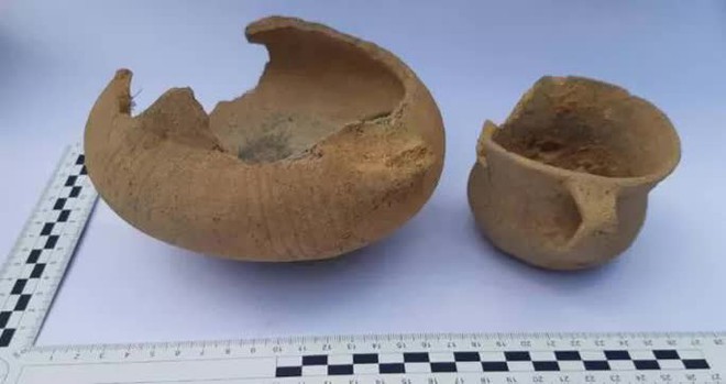 Nghịch cát, bé tiểu học phát hiện mộ cổ 2000 năm, có thể đầy vàng - Ảnh 2.