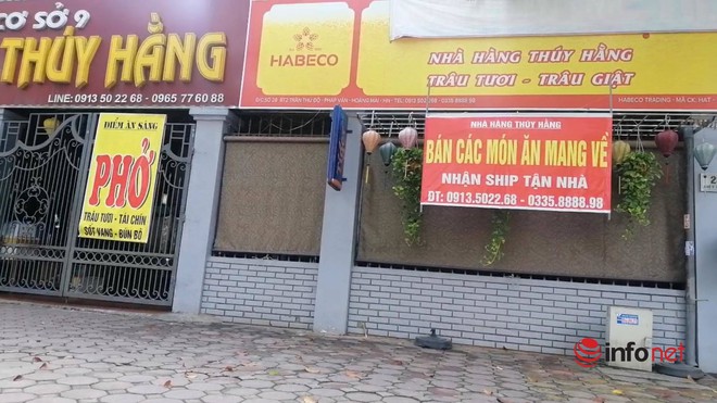 Quán xá Hà Nội đóng cửa im lìm, nơi chỉ bán mang về, khách quen muốn ngồi một lát cũng không được - Ảnh 1.