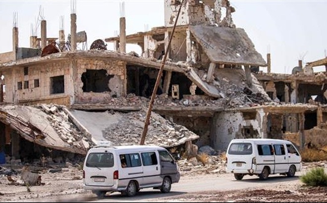 Một tòa nhà ở Deraa bị phá hủy do chiến sự. Ảnh: AlJazeera