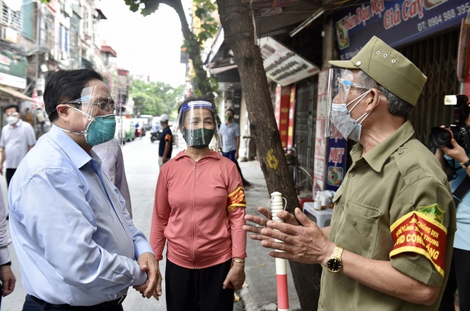 Thêm 12.607 ca Covid-19 mới; Hà Nội: Việc kiểm tra lịch trực kèm giấy đi đường ở Thanh Trì chỉ là hiểu nhầm - Ảnh 1.