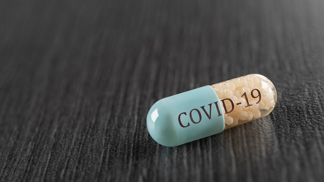 Pfizer bắt đầu thử nghiệm thuốc uống ngừa COVID-19 - Ảnh 1.