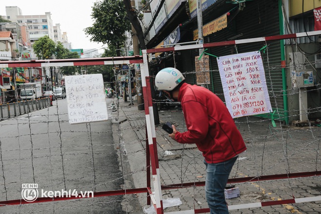 Toàn cảnh quận 7 trước ngày thí điểm mở cửa: Nhiều hàng quán ăn uống vẫn “im lìm” - Ảnh 11.