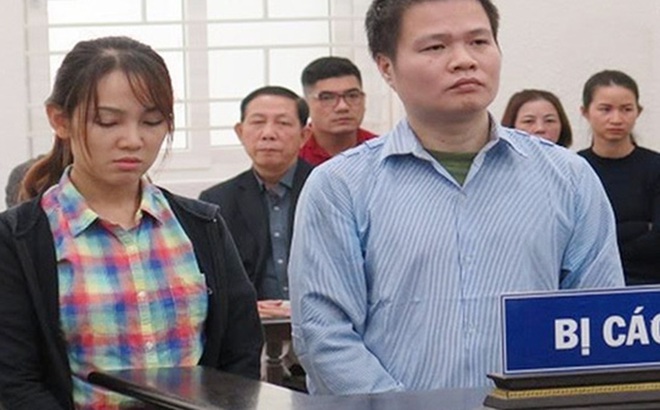 Vợ chồng bị cáo Thái và Trang tại phiên toà.