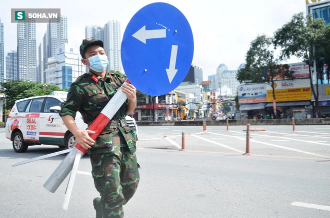 TP HCM: Dỡ hơn 300 chốt phong tỏa, rào kẽm gai, người dân vui mừng sắp được đi chợ rồi - Ảnh 1.