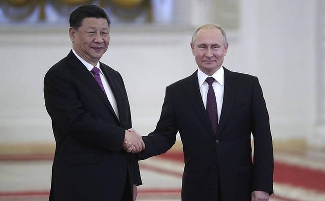 Tổng thống Nga Vladimir Putin và Chủ tịch Trung Quốc Tập Cận Bình. Ảnh: Tass