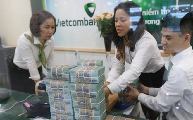 Một phần thanh khoản tiền đồng đã được NHNN hút vào qua bán hơn 20 tỷ USD dự trữ ngoại hối. Ảnh: Quốc Tuấn