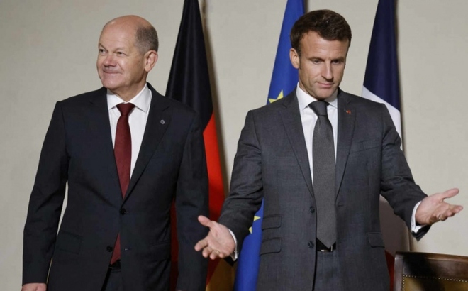Lãnh đạo Đức và Pháp. Ảnh: Le Monde.