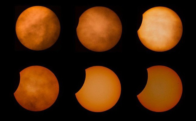 Những khoảnh khắc mặt trời dần dần bị mặt trăng che khuất ở Italia ngày 25/10.