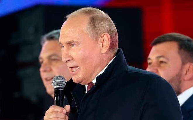 Tổng thống Putin phát biểu tại sự kiện chào mừng 4 vùng lãnh thổ mới sáp nhập Nga tối 30/9. Ảnh: AP