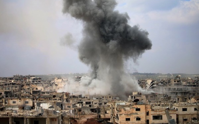 Cảnh đổ nát sau một cuộc không kích tại thành phố Daraa ở Syria. Ảnh minh họa: AFP