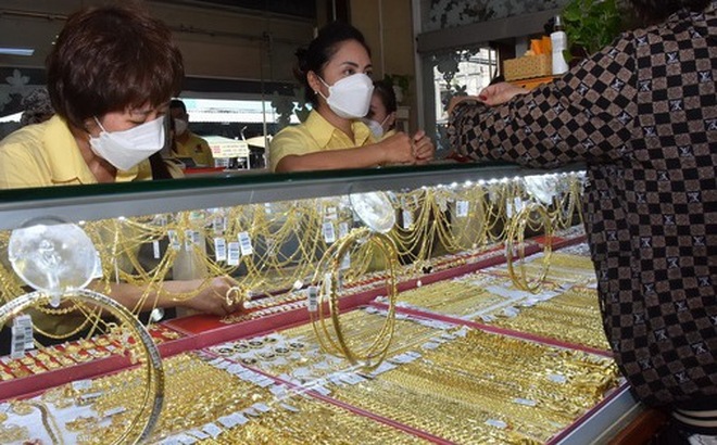 Giá vàng thế giới có lúc từ 1.640 USD/ounce lao xuống 1.614 USD/ounce