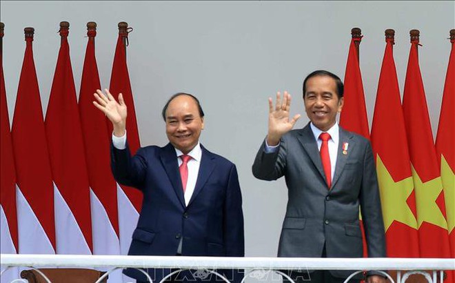 Chủ tịch nước Nguyễn Xuân Phúc và Tổng thống Indonesia Joko Widodo. Ảnh: Thống Nhất/TTXVN