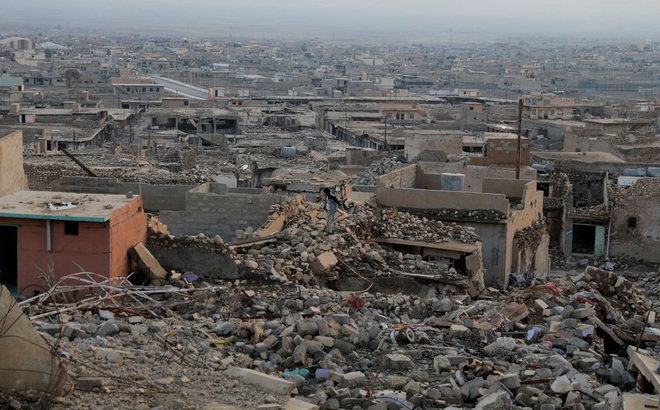 Khung cảnh nhà cửa bị phá hủy trong một vụ tấn công do IS gây ra tại thành phố Sinjar (Iraq) ngày 24/1/2022. Ảnh: Reuters