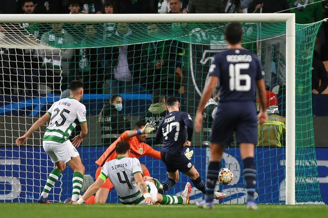 Hủy diệt Sporting, Man City đặt một chân vào tứ kết Champions League - Ảnh 4.