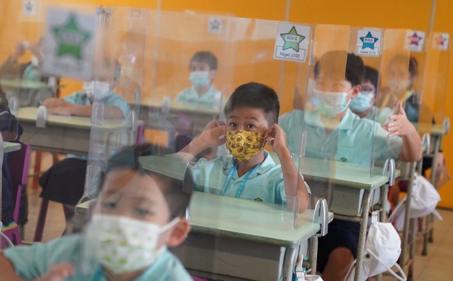 Hong Kong mở chiến dịch tiêm chủng cho trẻ từ 5-11 tuổi, coi đây là bước cần thiết để mở cửa trở lại trường học. Ảnh: SCMP