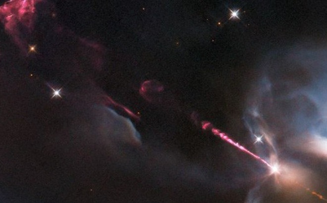 Cận cảnh tia laser bí ẩn từ vũ trụ - Ảnh: Hubble/NASA/ESA