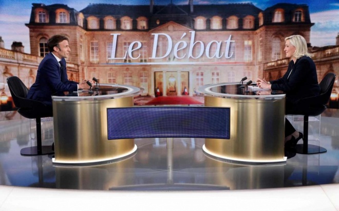 Ông Macron và bà Le Pen trong cuộc tranh luận tối 20/4. Ảnh: Le Monde