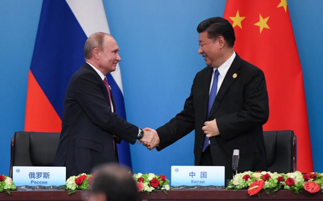 Tổng thống Nga Vladimir Putin và Chủ tịch Trung Quốc Tập Cận Bình. Ảnh: Getty