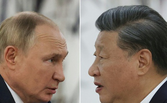 Ảnh ghép cho thấy Tổng thống Nga Vladimir Putin (trái) và Chủ tịch Trung Quốc Tập Cận Bình trong cuộc gặp bên lề hội nghị thượng đỉnh của SCO ở Samarkand, Uzbekistan ngày 15-9 - Ảnh: AFP