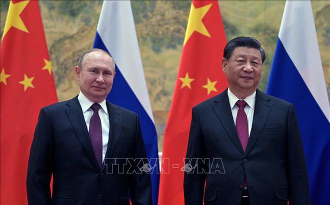 Chủ tịch Trung Quốc Tập Cận Bình (phải) và Tổng thống Nga Vladimir Putin tại cuộc gặp ở Bắc Kinh, ngày 4/2. Ảnh: AFP/TTXVN