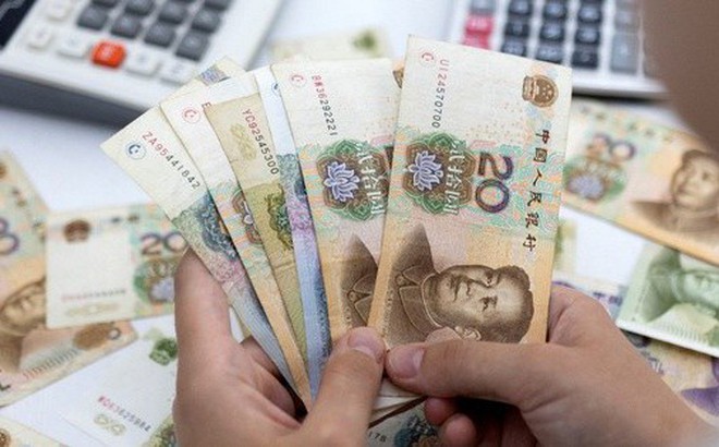 Đồng nhân dân tệ sẽ dẫn đầu trong kế hoạch của Nga nhằm tăng khối lượng giao dịch tiền tệ của các "quốc gia thân thiện", giảm sử dụng USD và euro - Ảnh: REUTERS