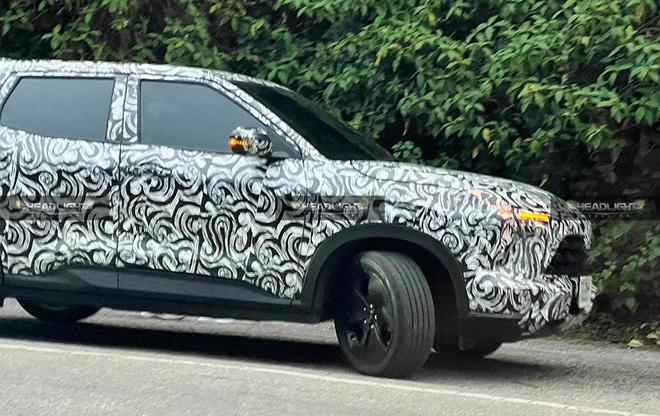 Mitsubishi Xforce 2025 lộ ảnh chạy thử: Động cơ hybrid mới, mâm khí động học, về Việt Nam sẽ làm khó thêm Yaris Cross - Ảnh 4.