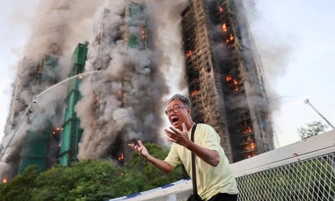 Vụ cháy kinh hoàng ở Hong Kong xảy ra chiều 26/11. Ảnh: Reuters