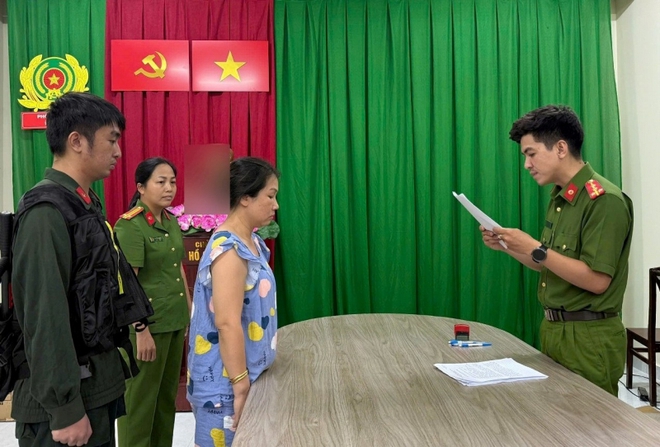 Bắt tạm giam vợ chồng giám đốc Ngô Ánh Hồng - Ảnh 1.