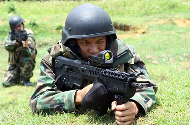 Việt Nam chế tạo thành công đạn súng trường TAR-21 - Ảnh 1.