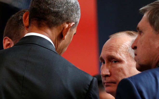 24h qua ảnh: Putin và Obama nhìn nhau bằng ánh mắt băng giá - Ảnh 3.